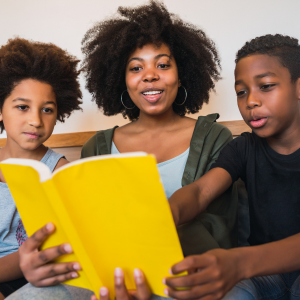 Family reading on a couch
