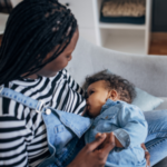 Image of mother breast feeding baby