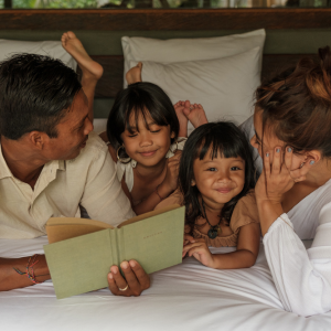 Family reading a book
